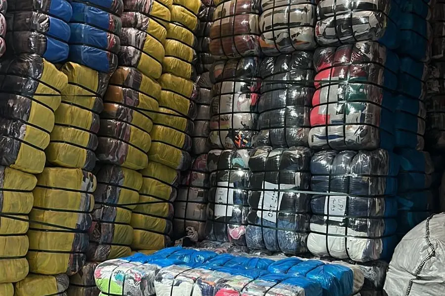 Wrapped and strapped clothing bales in stock in our warehouse